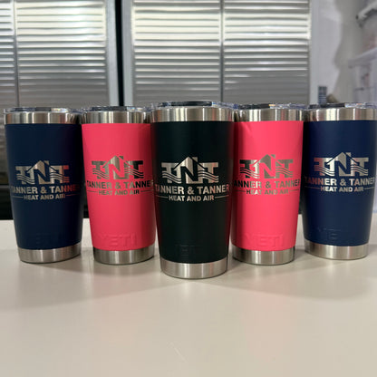 HVAC company logo laser engraved on five YETI Rambler 20 oz Tumblers in Navy, Tropical Pink and Black