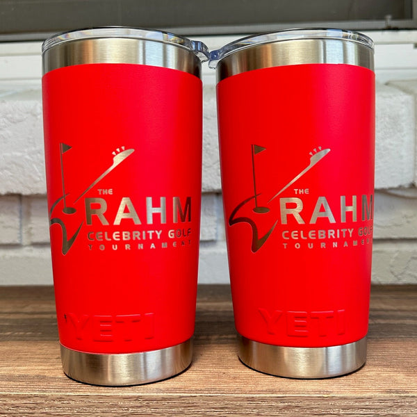 Golf tournament logo laser engraved on two Rescue Red YETI Rambler 20 oz Tumblers