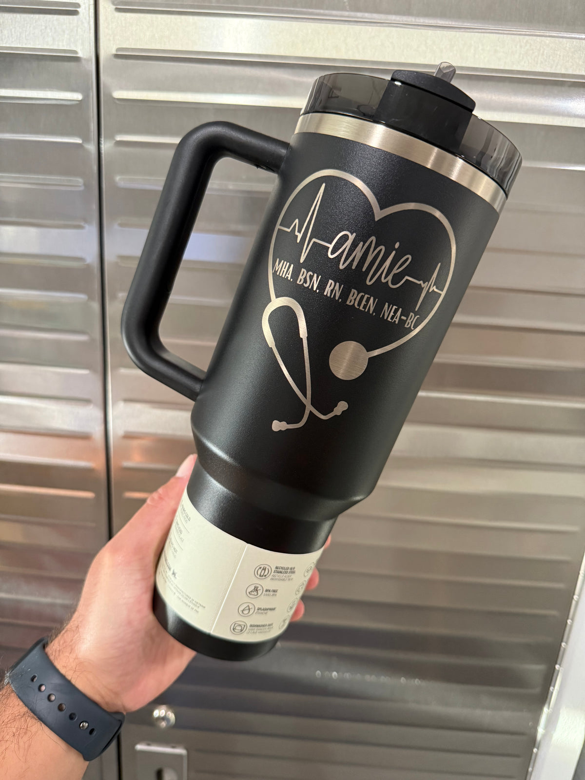 A personalized RN Stanley Quencher engraved with a name