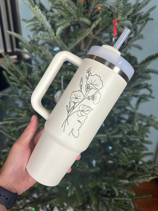 Personalized birth flower Stanley Quencher engraved with a name