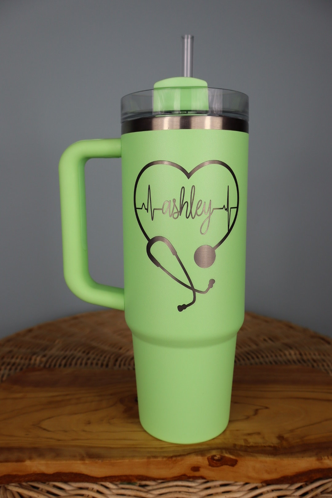 A personalized RN Stanley Quencher engraved with a name