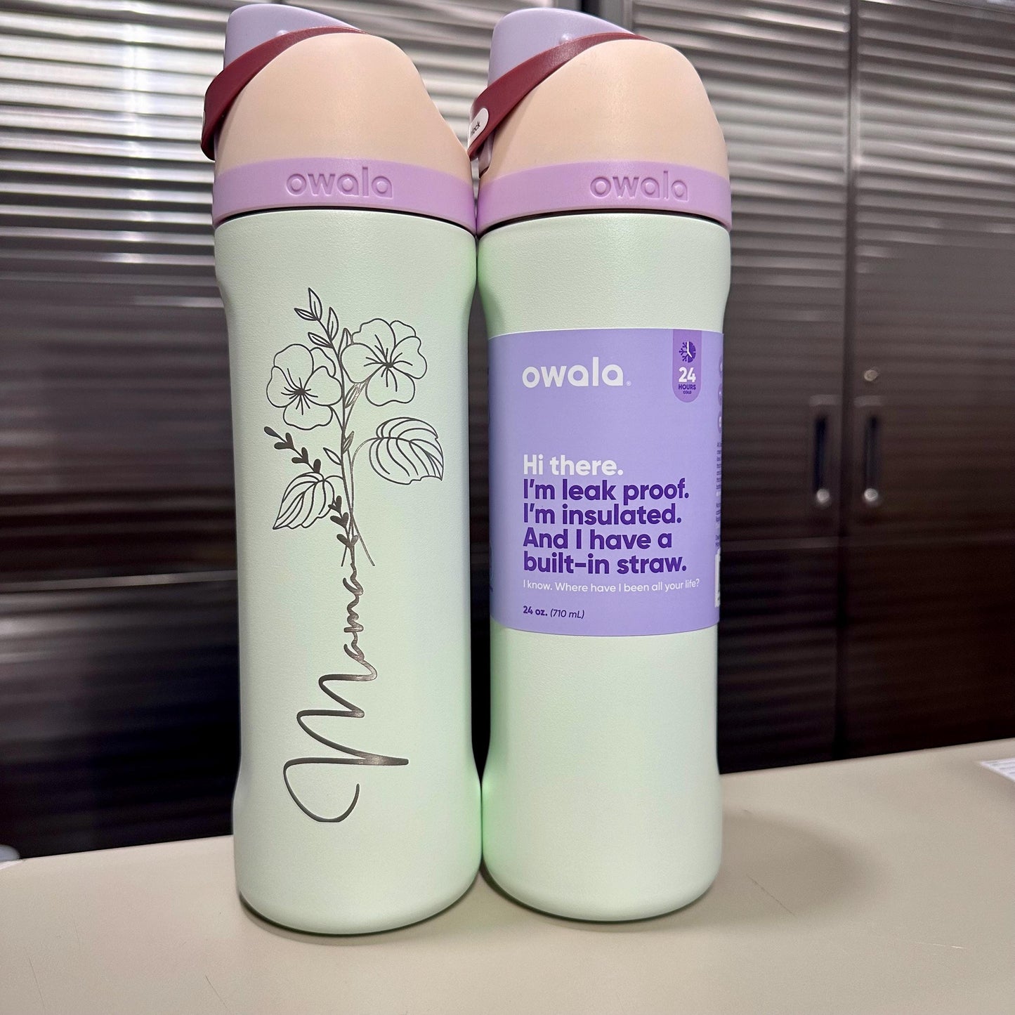 Laser engraved birth month flower on an Owala FreeSip bottle