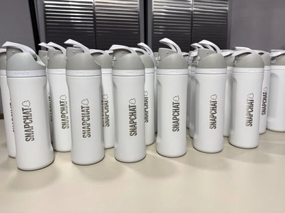Company logo engraved on a batch of Owala FreeSip bottles