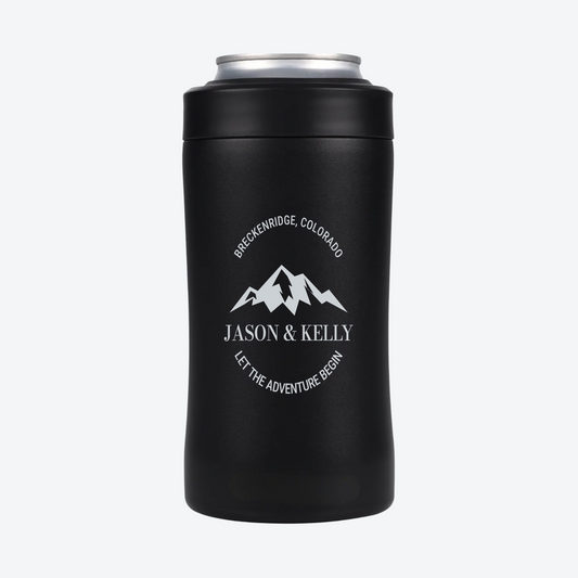 Digital mockup of a Black BRRWare 3-in-1 can cooler with silver adventure badge engraving on the back: JASON & KELLY, BRECKENRIDGE, COLORADO, LET THE ADVENTURE BEGIN.